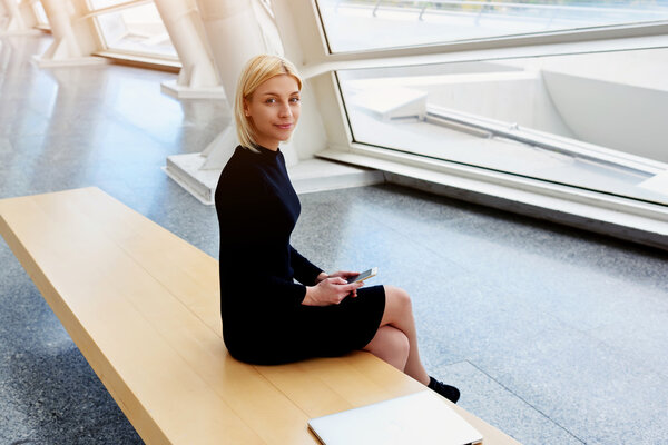 woman holding mobile phone