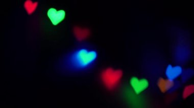 Bokeh ışığı soyut kalp arka planı. Sevgililer Günü konsepti. 