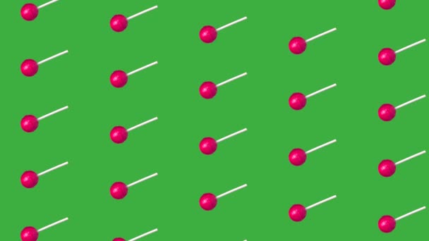 Animación de patrón de piruleta en pantalla verde, caramelos de rotación en palos. — Vídeos de Stock