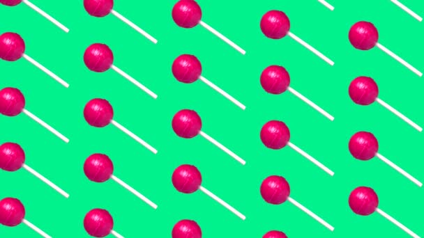 Animation lollipop on mint green background. Minimal pop art style motion desing — Stock Video