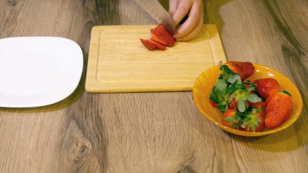 Close Up Female Hands Slicing Fresh Organic Strawberries — Stock Video