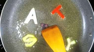 Stir-Frying karışık Alfabe harf, kelime Tasty