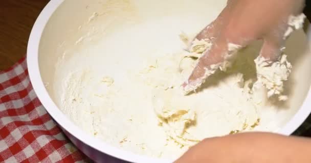 Female hands in flour closeup kneading dough — Stock Video