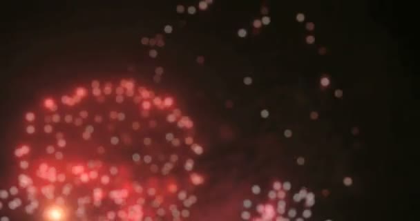 Wazig fairy lichten uit fireworks achtergrond. — Stockvideo