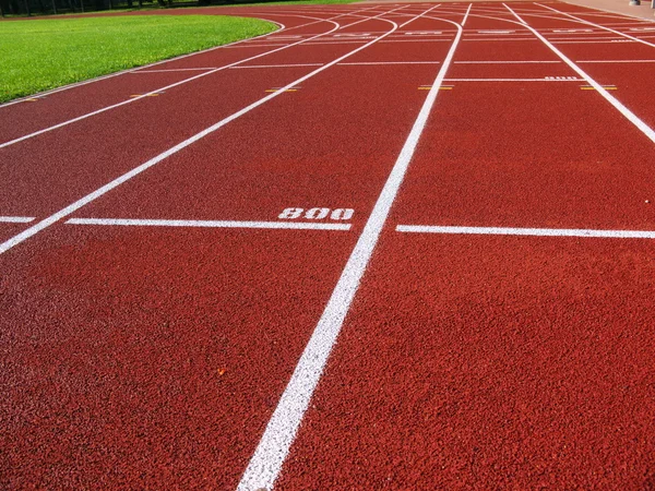 Červený oválný na stadionu — Stock fotografie