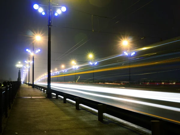 Stone Bridge lights in fog ,Riga — Stock Photo, Image