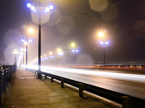 Stone Bridge lights in fog ,Riga — Stock Photo, Image