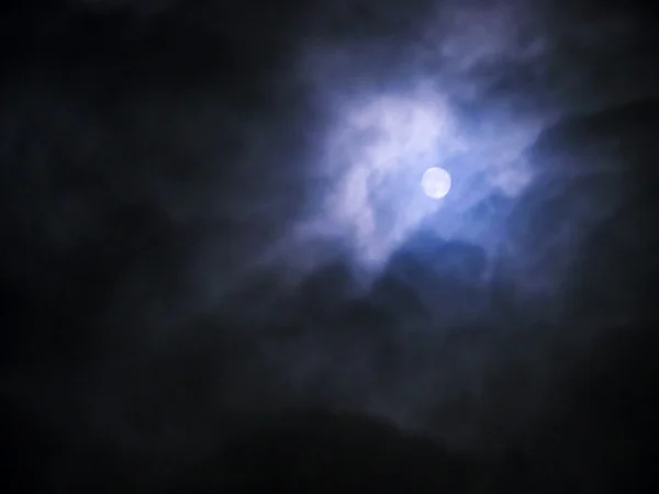 Moon and clouds in the night — Stock Photo, Image
