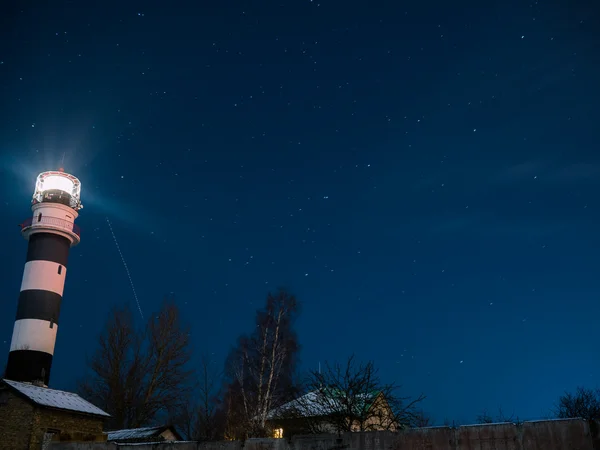 Riga Lighthouse in a starry night — Stock Photo, Image