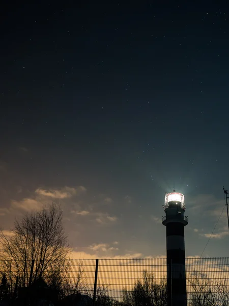 Riga Lighthouse in a starry night — Stock Photo, Image