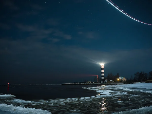 Riga Lighthouse in a starry night — Stock Photo, Image