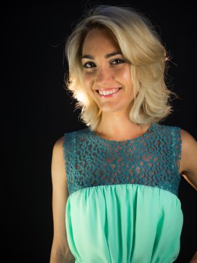 studio Photo of beautiful woman in dress 