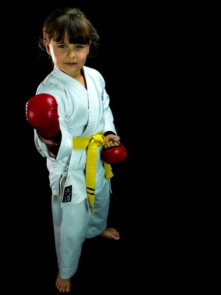 Portrait of beautiful girl in kimono exercising — Stock Photo, Image