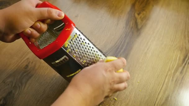 Lemon zest being grated, slow motion — Stock Video