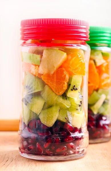 Fruits layered in glass jars — Stock Photo, Image