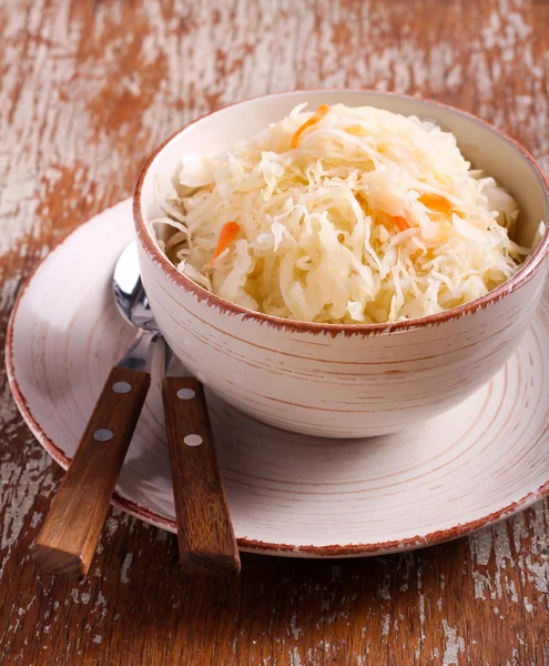 Pickled cabbage with carrots in a bowl — Stock Photo, Image