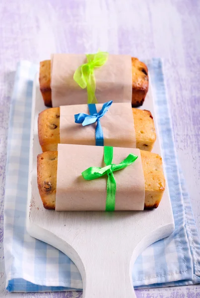 Mini loaves with raisin on board — Stock Photo, Image