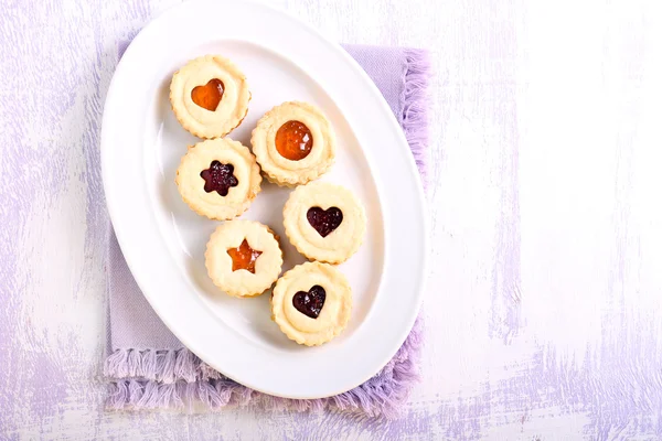 Jam filling linzer cookies on plate — Stock Photo, Image