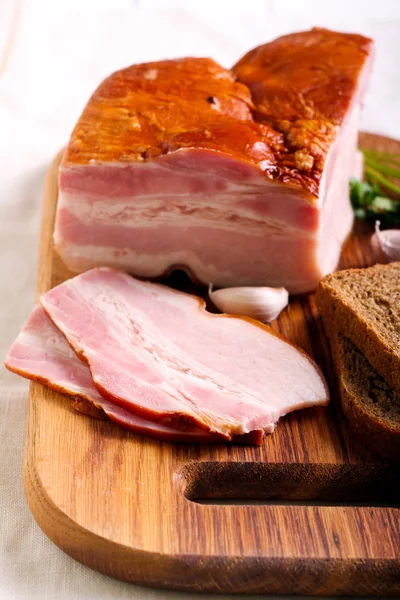 Smoked bacon with fat — Stock Image Smoked bacon with fat Royalty Free Stock Photos