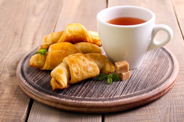 Croissant with cinnamon — Stock Photo, Image