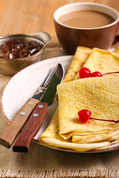 Crepes with cherry on plate, — Stock Photo, Image