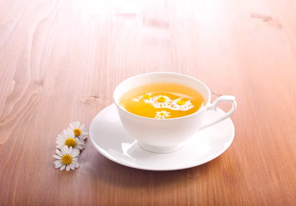 Chamomile tea in a cup — Stock Photo, Image