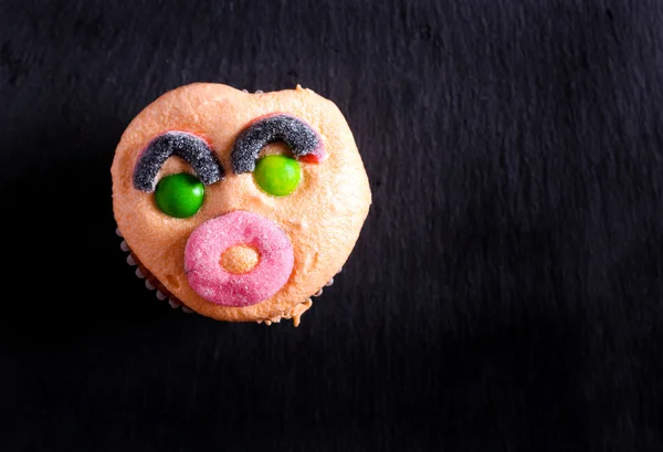 Halloween decorated cupcakes on dark background — Stock Photo, Image