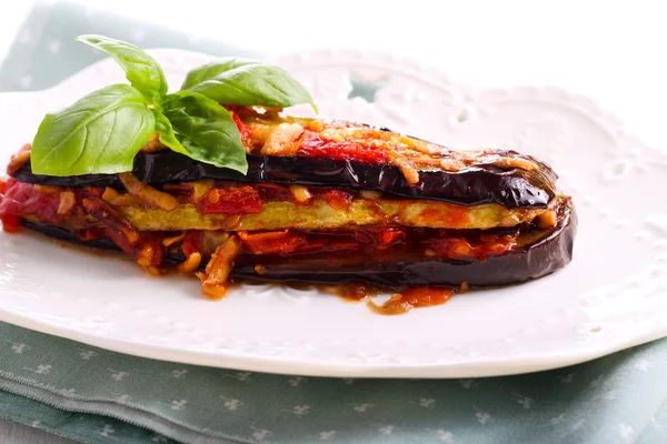 Eggplant and zucchini in tomato sauce — Stock Photo, Image