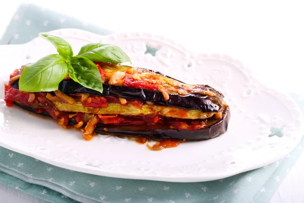 Eggplant and zucchini in tomato sauce — Stock Photo, Image