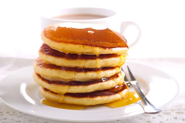 Lemon pancakes with honey on top — Stock Photo, Image