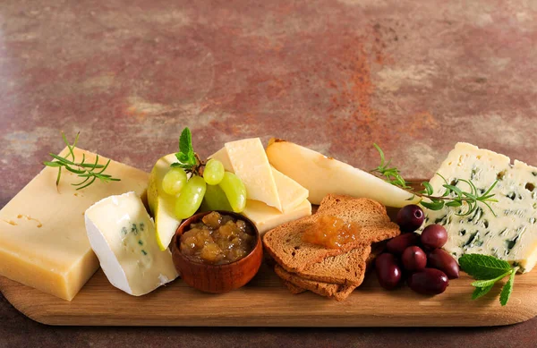 Cheese Board Assortment Cheese Fig Jam Grapes Honey Olives — Stock Photo, Image