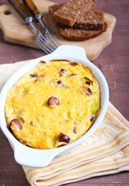 Cabbage and sausage gratin — Stock Photo, Image