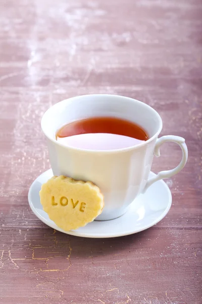 Tasse Tee und Kekse — Stockfoto