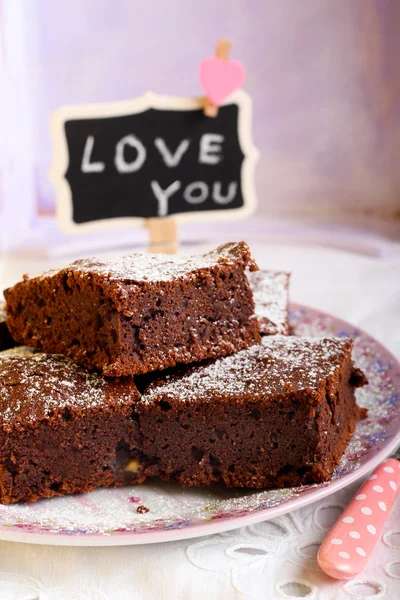 Chocolate brownies dusted with icing sugar — Stock Photo, Image