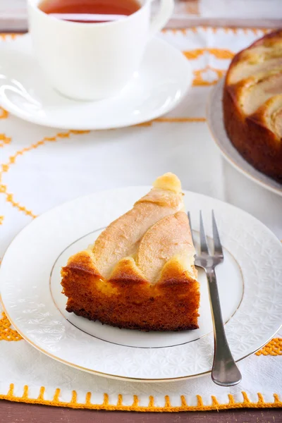 Slice of pear topped cake — Stock Photo, Image