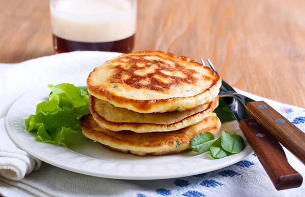 Pile of sweetcorn and herb pancakes — Stock Photo, Image