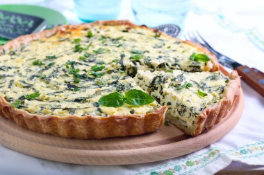 Feta cheese and spinach  tart clipart