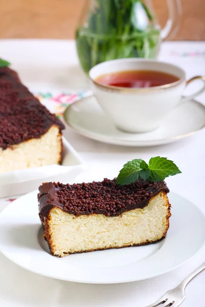 Cheesecake with chocolate topping — Stock Photo, Image