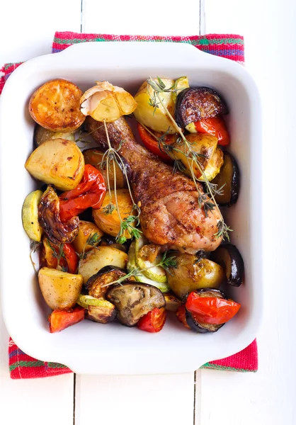 Baked vegetables and chicken drumstick — Stock Photo, Image