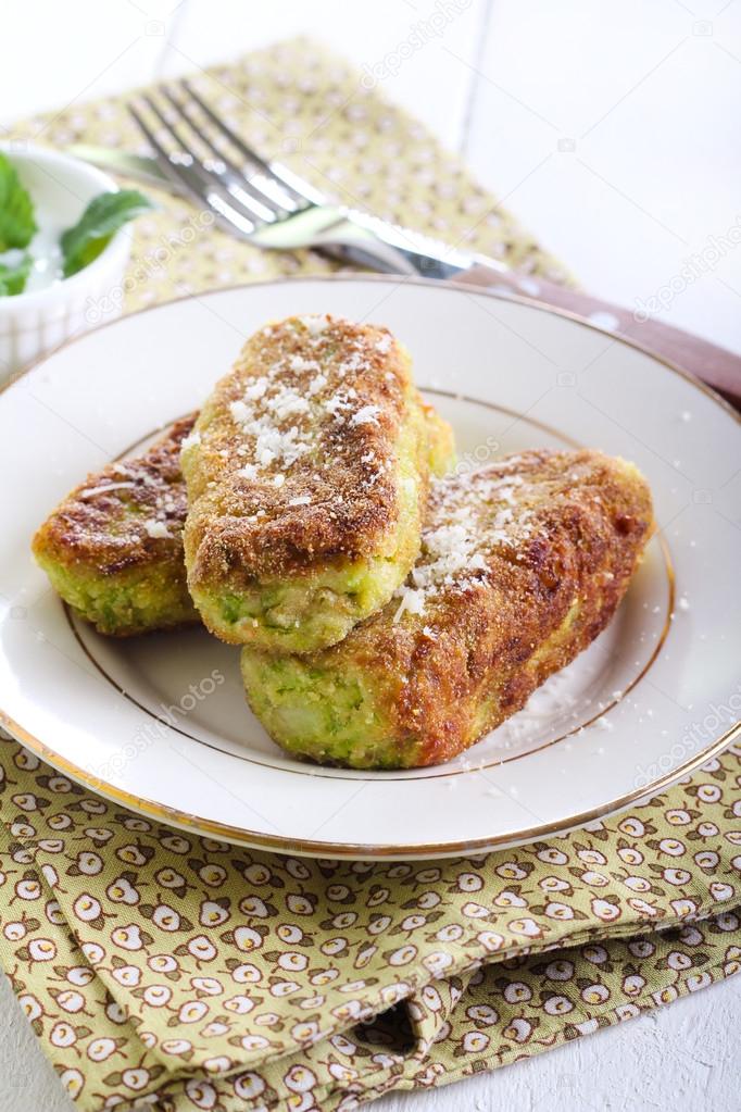 Zucchini cakes with grated parmesan
