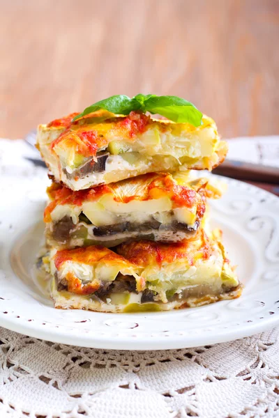 Courgette and eggplant cheese and tomato bake — Stock Photo, Image
