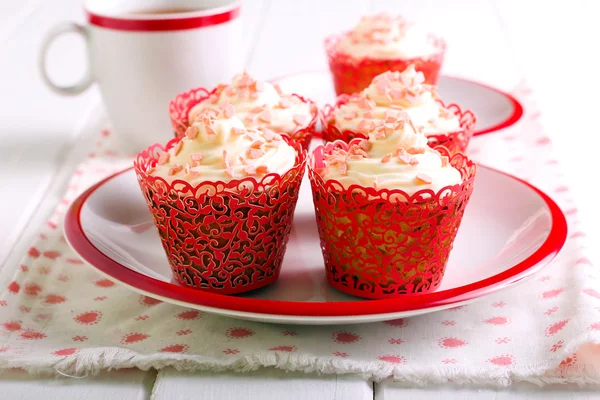 Vanille berijpen cupcakes Stockfoto