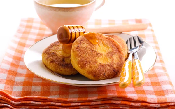 Pumpkin fritters with honey — Stock Photo, Image