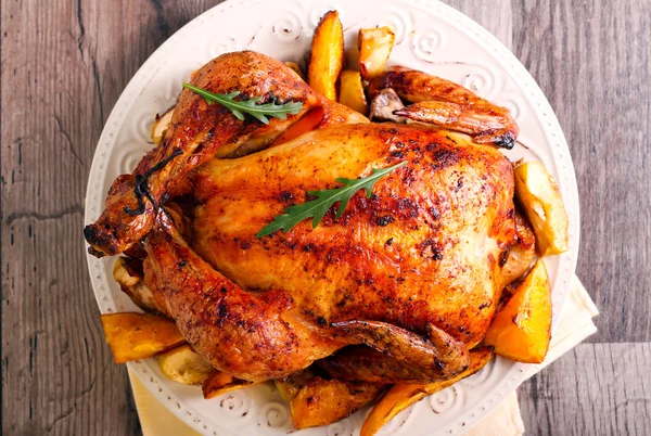 Roasted citrus chicken on plate — Stock Photo, Image