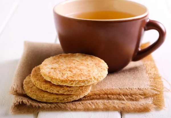 Coconut biscuits and cup of tea — Stock Photo, Image