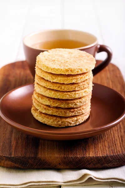 Coconut biscuits and cup of tea — Stock Photo, Image