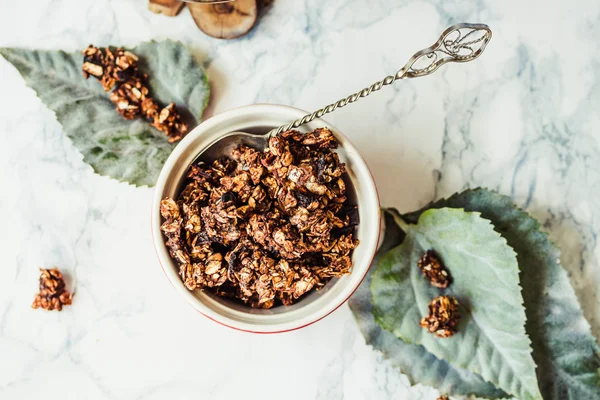 Chocolate homemade granola with peanut butter and pear — Stock Photo, Image