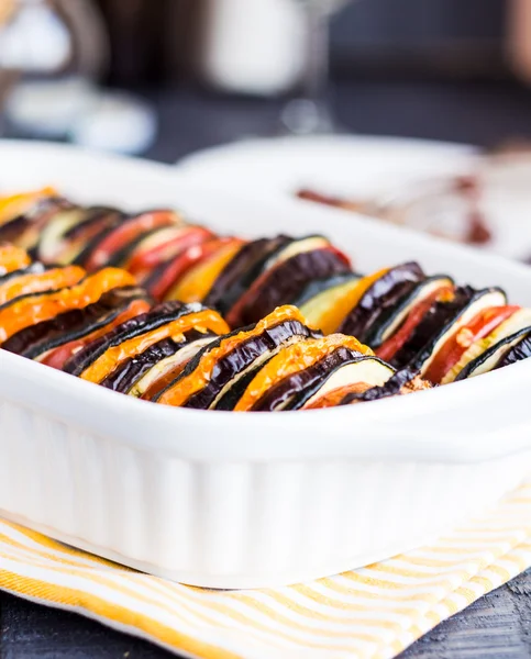 Ratatouille in white casserole on a dark background — Stock Photo, Image