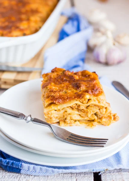 Piece of meat lasagna with mushrooms on a  plate — Stock Photo, Image
