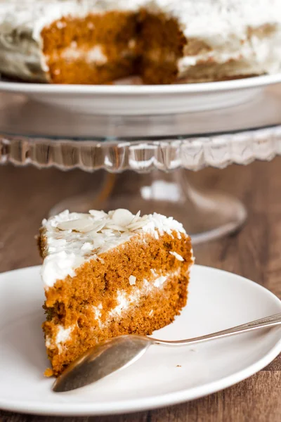 section of honey cake with whipped cream